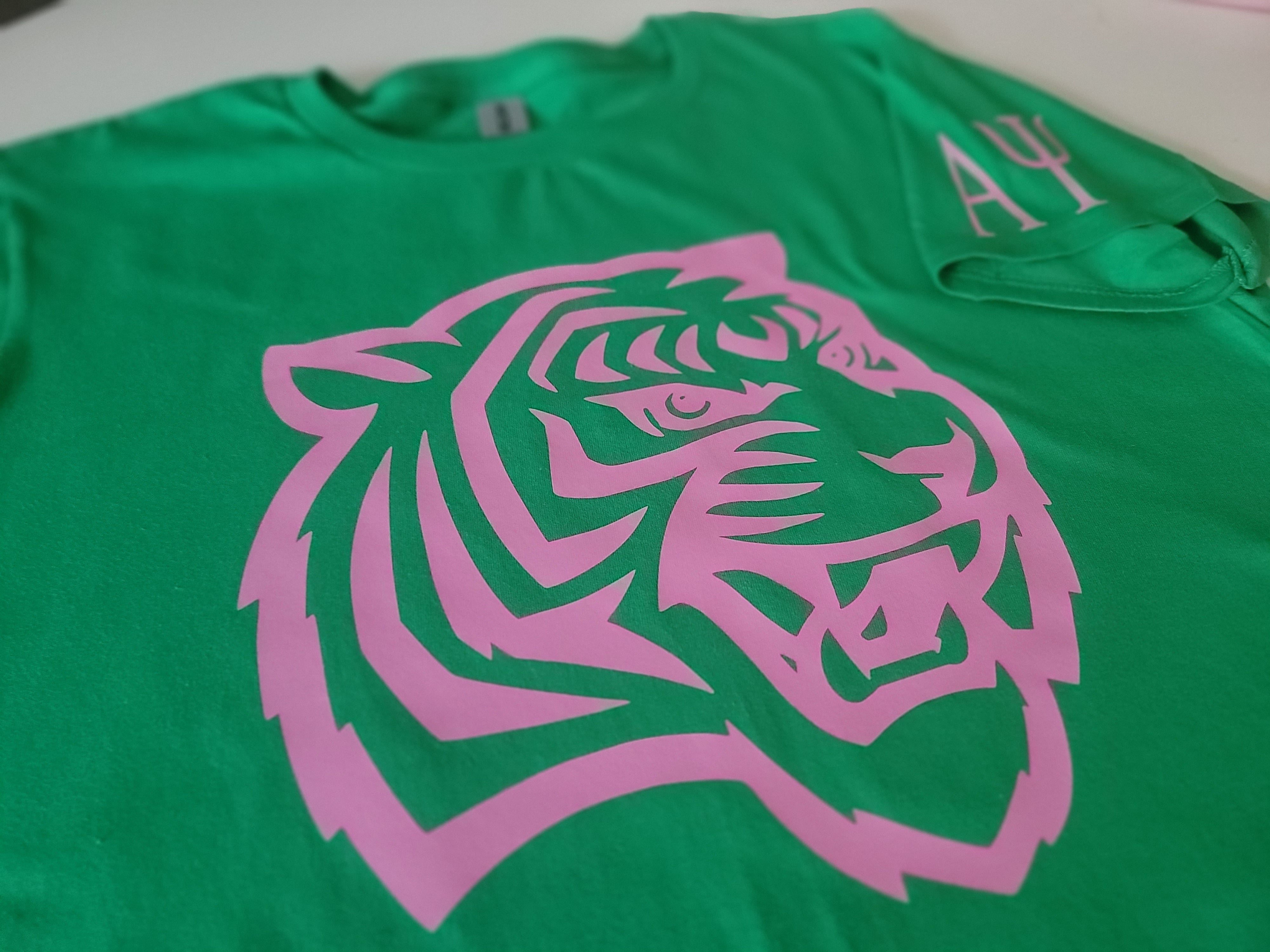 Alpha Psi Pink & Green logo Shirt